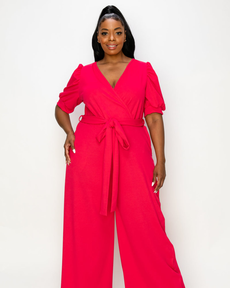 Front of a model wearing a plus size Iris Wrap Pocket Jumpsuit in Berry by L I V D. | dia_product_style_image_id:240948